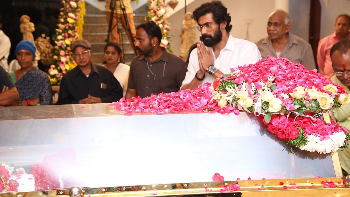 Rana Daggubati pays his last respects to the mortal remains of Telugu superstar Krishna in Hyderabad. Credit: Twitter/@SureshKondi_