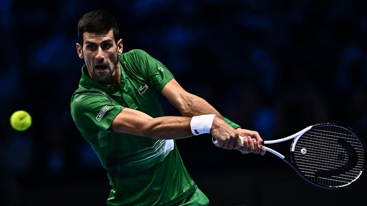 Serbia's Novak Djokovic returns to Russia's Andrey Rublev during their round-robin match on November 16, 2022 at the ATP Finals tennis tournament in Turin.