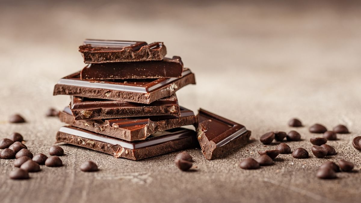 Dark Chocolate: Dark Chocolate is the greatest source of caffeine apart from coffee. Its rich and dense flavour is enough to keep your senses engaged. Four squares of pure dark chocolate can have a similar effect on sleep as a whole cup of coffee. Credit: Getty Images