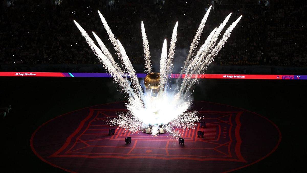 A FIFA World Cup trophy replica is seen on the pitch before the first match. Credit: Reuters Photo