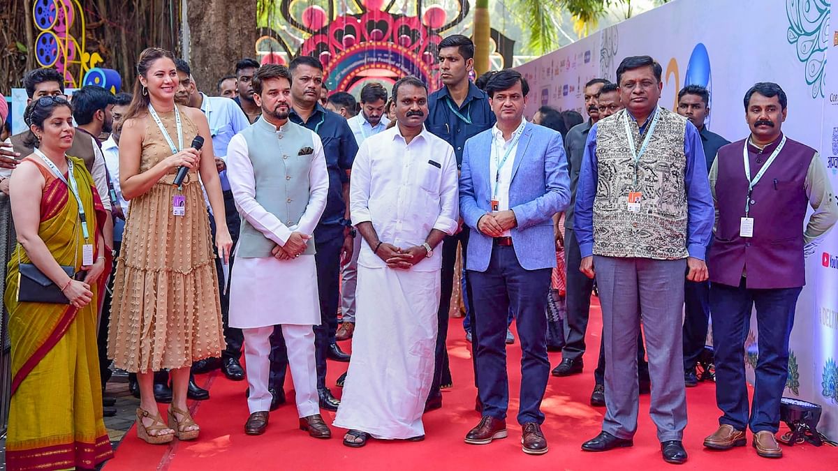 Anurag Singh Thakur, Dr L Murugan and Apurva Chandra get clicked on the red carpet during the opening ceremony of the 53rd International Film Festival of India (IFFI), in Goa. Credit: PIB