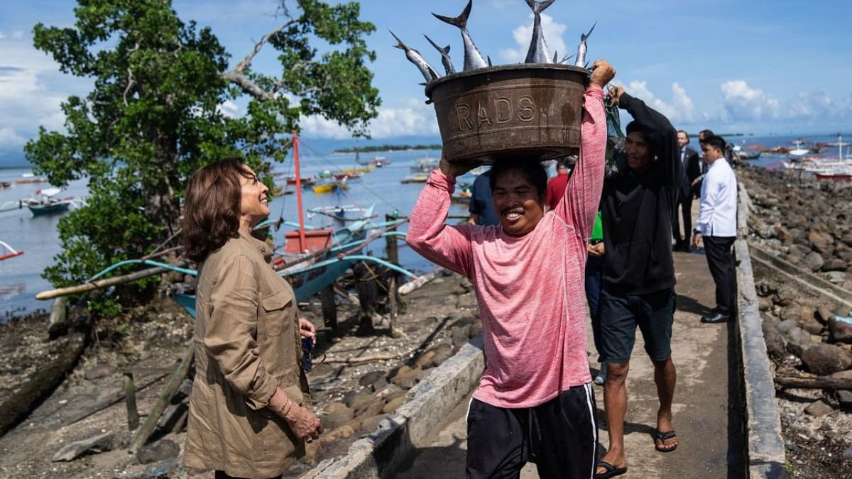 US Vice-President Kamala Harris tours local village Tagburos on unsustainable fishing, in Palawan. Credit: AFP Photo
