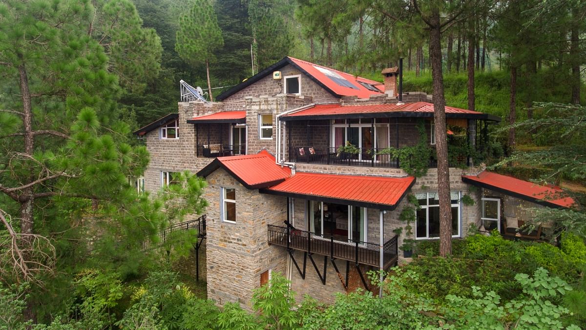 Ekam, Chail: Made of wood and stone, and equipped with modern furnishings, every part of the home has a rhythm of its own. This 4-bedroom, pet-friendly regal abode is hidden in the midst of a forest in Chail. From the charming attic room with a stargazing roof to floor-to-ceiling windows, sit-outs on every floor offering stunning vistas of the snow-capped Himalayas, this is a must-visit place for nature lovers. Credit: Special Arrangement