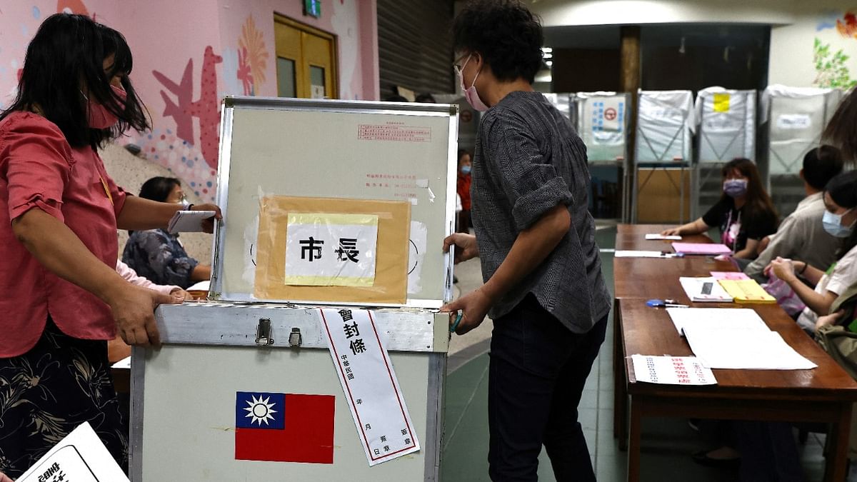 Staff prepare the ballot box ahead of election day in Taipei, Taiwan. Credit: Reuters Photo