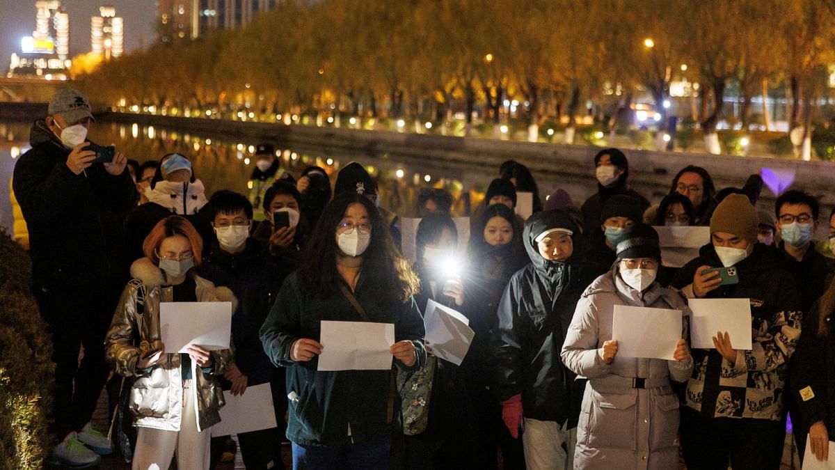 Hundreds of people took to the streets in China's major cities on Sunday (November 27) to protest against the country's zero-Covid policy, in a rare outpouring of public anger against the state. Credit: Reuters Photo