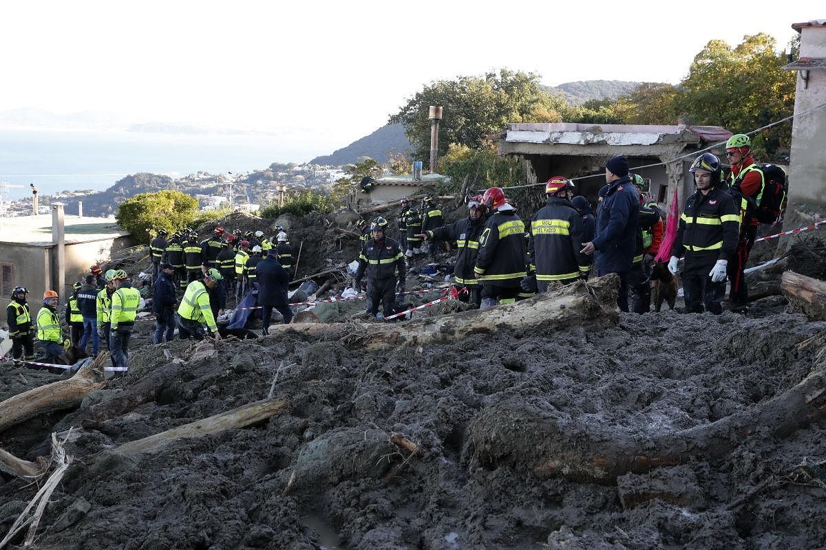 Rescuers work after heavy rainfall triggered landslides that collapsed buildings, in Casamicciola, on the southern Italian island of Ischia. Authorities said that the landslide that early Saturday destroyed buildings and swept parked cars into the sea left seven people dead and 5 missing. Credit: AP Photo