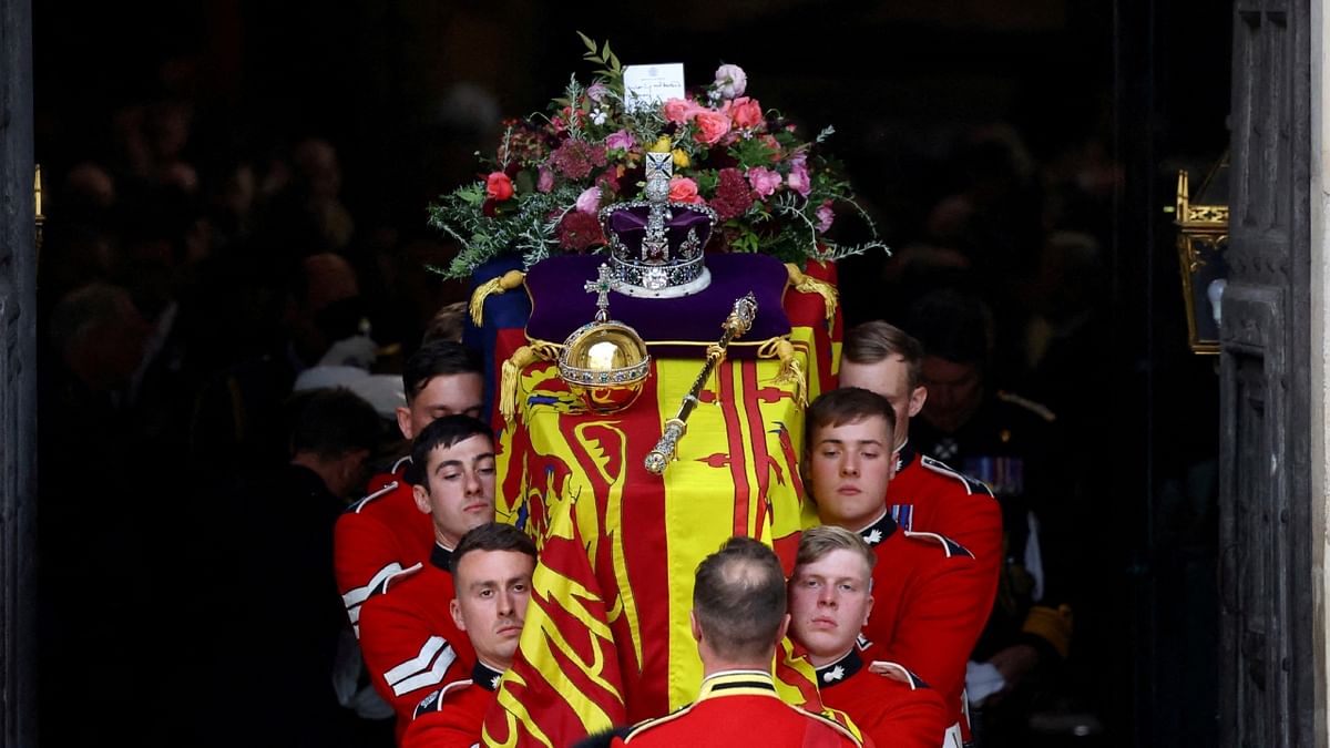 The coffin of Britain's Queen Elizabeth is carried out of Westminster Abbey after a service on the day of her state funeral and burial, in London, Britain. Credit: Reuters Photo