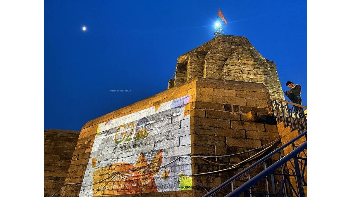 The Shankaracharya Temple in Srinagar is illuminated with the logo of G20 Summit 2023. Credit: Twitter/@basiitzargar