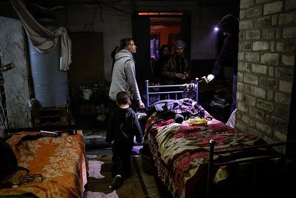 A family lives in a basement used as a bomb shelter in Bakhmut, Donetsk region. Credit: AFP Photo