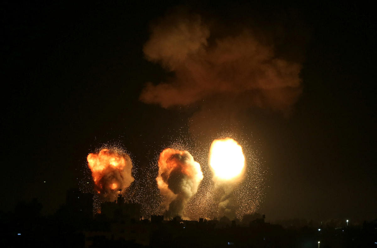 Smoke and flames rise during an Israeli air strike in the Gaza Strip. Credit: Reuters Photo