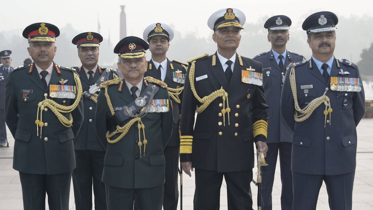 Chief of Defence Staff General Anil Chauhan with Chief of Naval Staff Admiral R Hari, Air Chief Marshal VR Chaudhari, Vice Chief of the Army Staff Lt General BS Raju and others at the National War Memorial to pay tribute on the occasion of Navy Day in New Delhi. Credit: PTI Photo