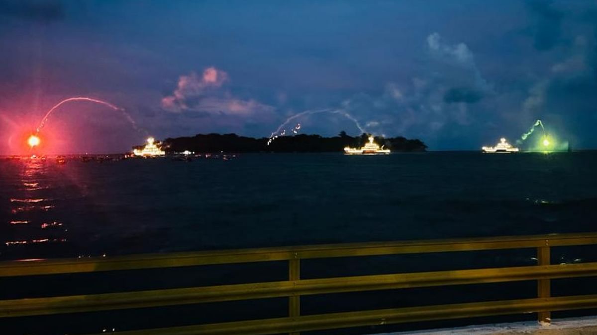 The naval ships of Andaman & Nicobar Command 'Dressed Overall' till sunset and switched on outline illumination lights with synchronised firing of flares at anchorage off Flag Point. Credit: Twitter/@AN_Command