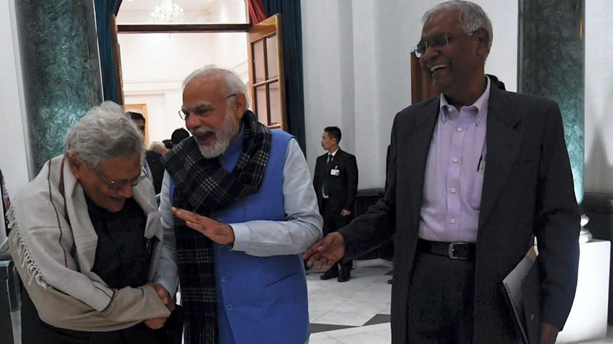 CPM general secretary Sitaram Yechury, Prime Minister Narendra Modi and CPI National General Secretary D Raja share light moment during the all-party meeting on G20 summit, in New Delhi. Credit: PTI Photo