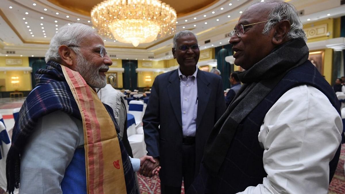 Prime Minister Narendra Modi interacts with Congress President Mallikarjun Kharge and CPI National General Secretary, D Raja during the all-party meeting on G20 summit, in New Delhi. Credit: PTI Photo