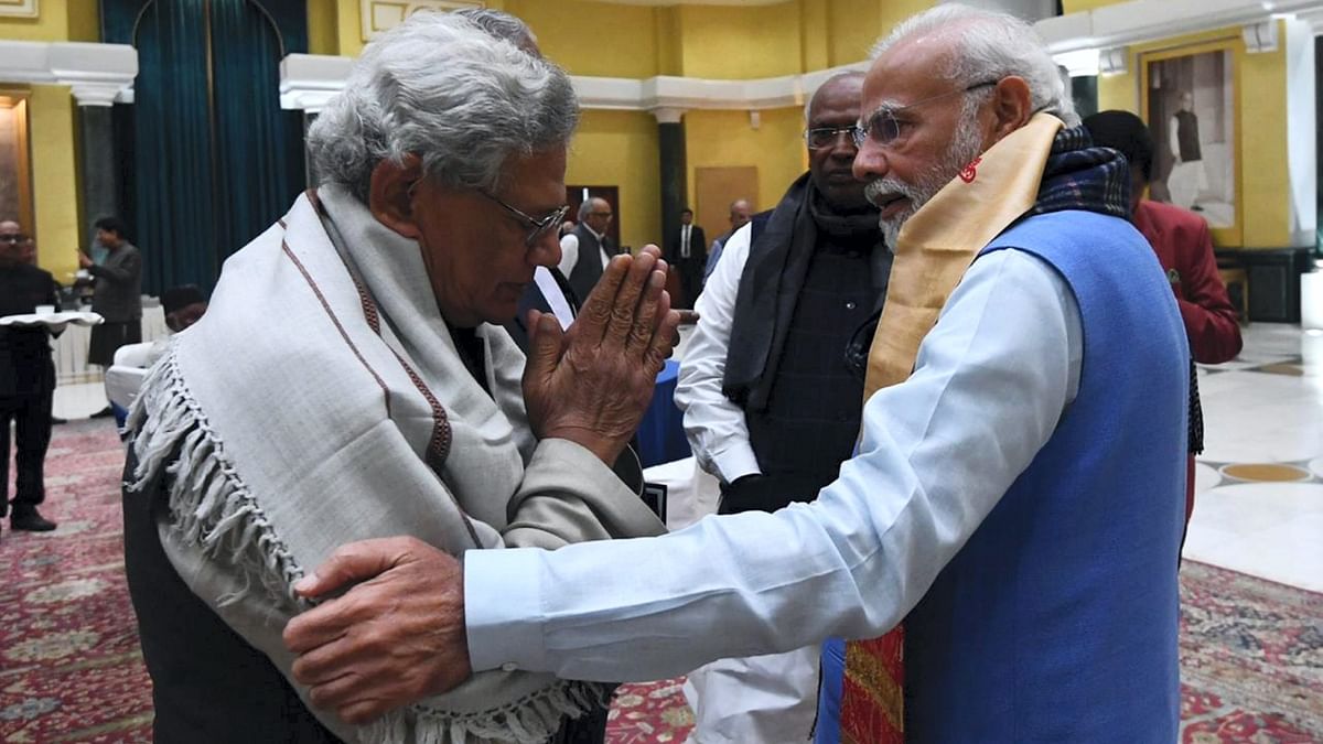 CPM general secretary Sitaram Yechury greets Prime Minister Narendra Modi during the all-party meeting on G20 summit, in New Delhi. Credit: PTI Photo