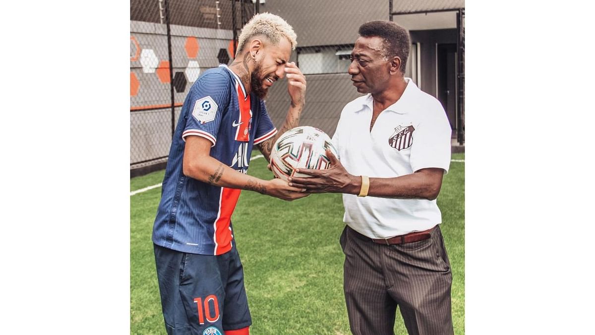 In this photo, he is seen with soccer legend Pele lookalike. Credit: Instagram/@sosiadoney