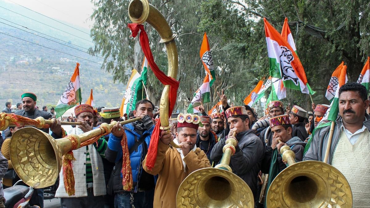 Congress workers celebrates the party's victory in Himachal Pradesh Assembly elections, in Kullu. Credit: PTI Photo