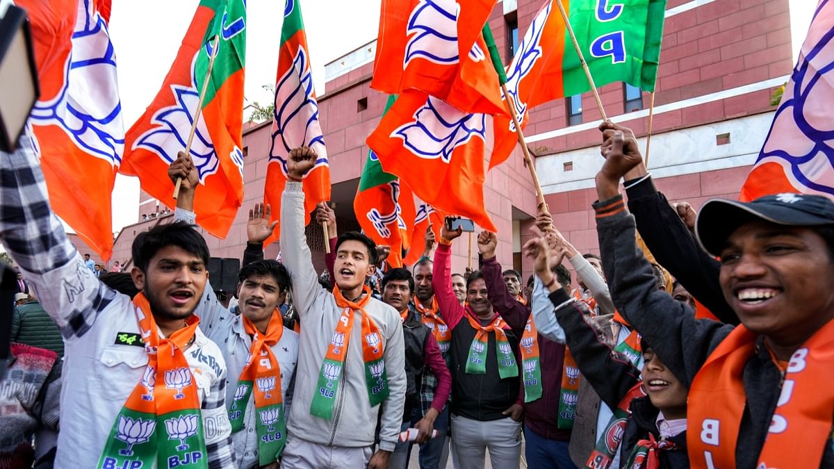 BJP workers celebrate the party's victory in Gujarat Assembly elections, at BJP Headquarters in New Delhi. Credit: PTI Photo