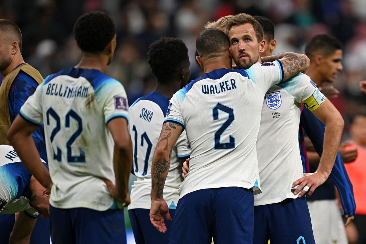 England's defender #02 Kyle Walker and England's forward #09 Harry Kane react at the end of the Qatar 2022 World Cup quarter-final football match. Credit: AFP Photo