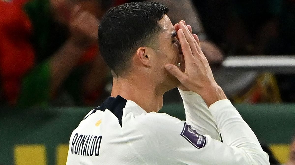 Cristiano Ronaldo reacts during the Qatar 2022 World Cup quarter-final football match between Morocco and Portugal at the Al-Thumama Stadium in Doha. Credit: AFP Photo