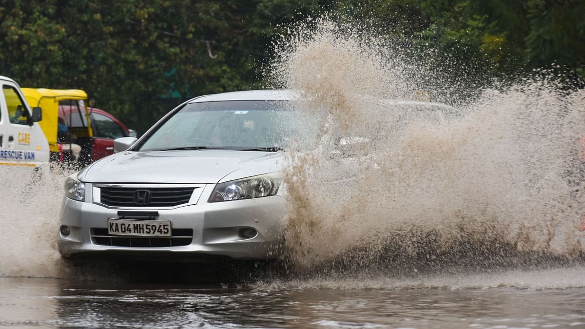 Avoid Puddles of water: Hydroplaning, which happens when the water on the road makes the tyres lose contact with the surface is one of the most common causes of accidents on wet roads and this prevents the brakes from working. Credit: Pushkar V/DH Photo