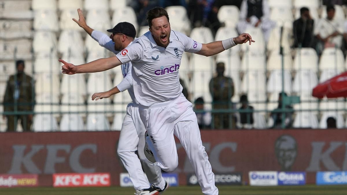 England's Ollie Robinson celebrates after taking the last wicket of Pakistan's Mohammad Ali (not pictured) during the fourth day of the second cricket Test match between Pakistan and England at the Multan Cricket Stadium. Credit: AFP Photo