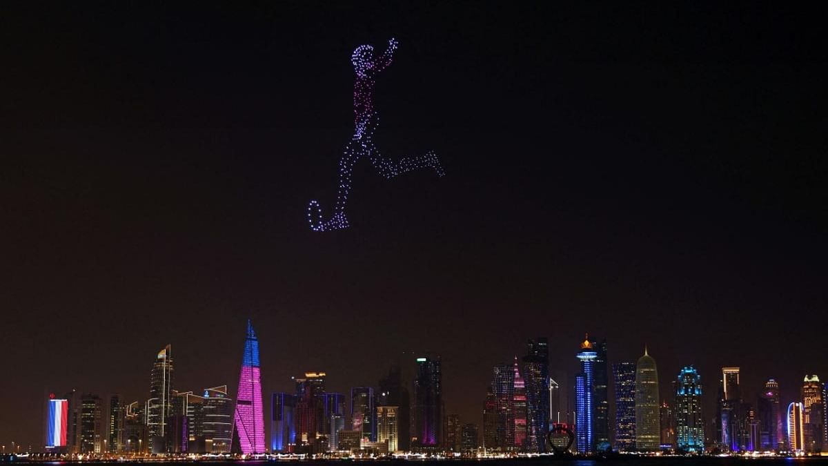 Drones lighting up the sky in front of West Bay in Doha during the Qatar 2022 World Cup football tournament. Credit: AFP Photo