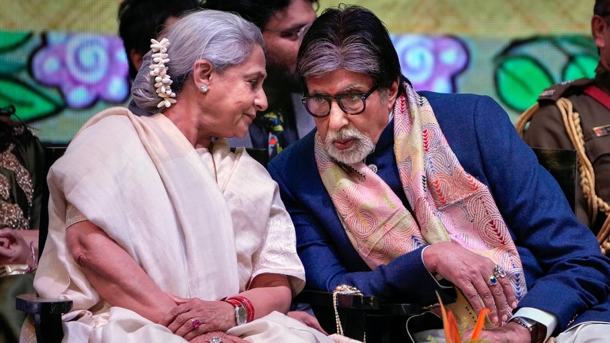Bollywood's power couple Amitabh Bachchan and Jaya Bachchan get clicked during the inauguration of the 28th Kolkata International Film Festival, in Kolkata. Credit: PTI Photo