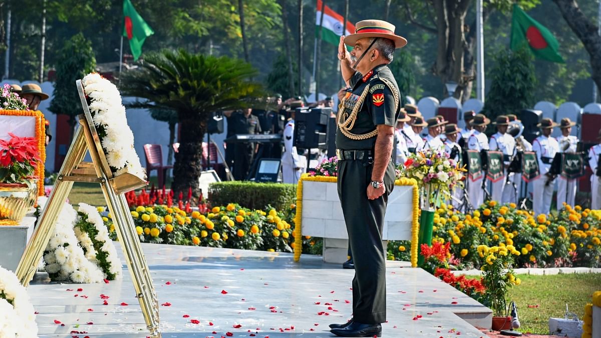 Lt Gen RP Kalita, GOC-in-C, Eastern Command paid his tribute at the Vijay Smarak during Vijay Diwas 2022 celebrations at Fort William, in Kolkata. Credit: PTI Photo