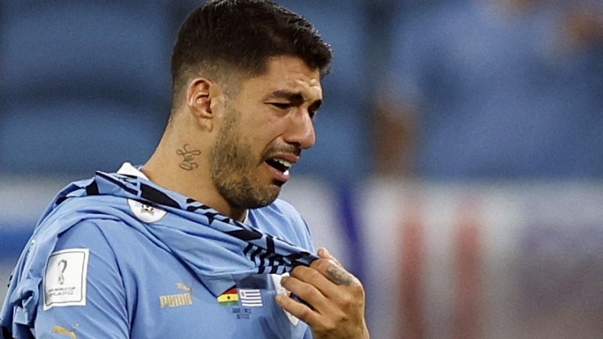 It was the end of the line too for Luis Suarez as Uruguay crashed out on goal difference. Here, Suarez walks off dejected as his team exits the tournament. Credit: Reuters Photo