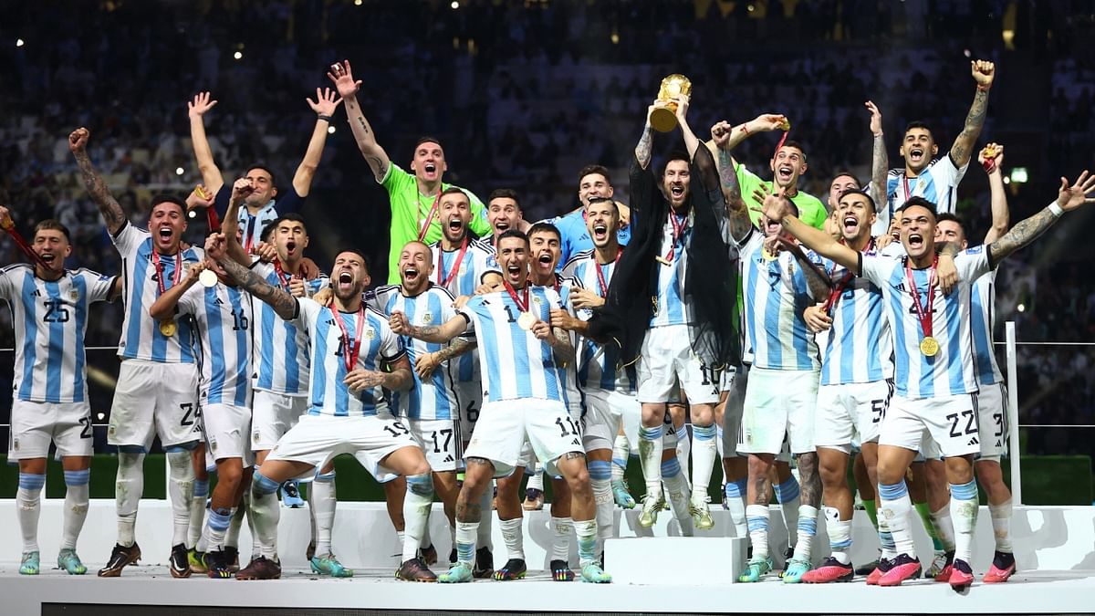 Argentina's Lionel Messi and his team members celebrate the 2022 World Cup win. Credit: Reuters Photo