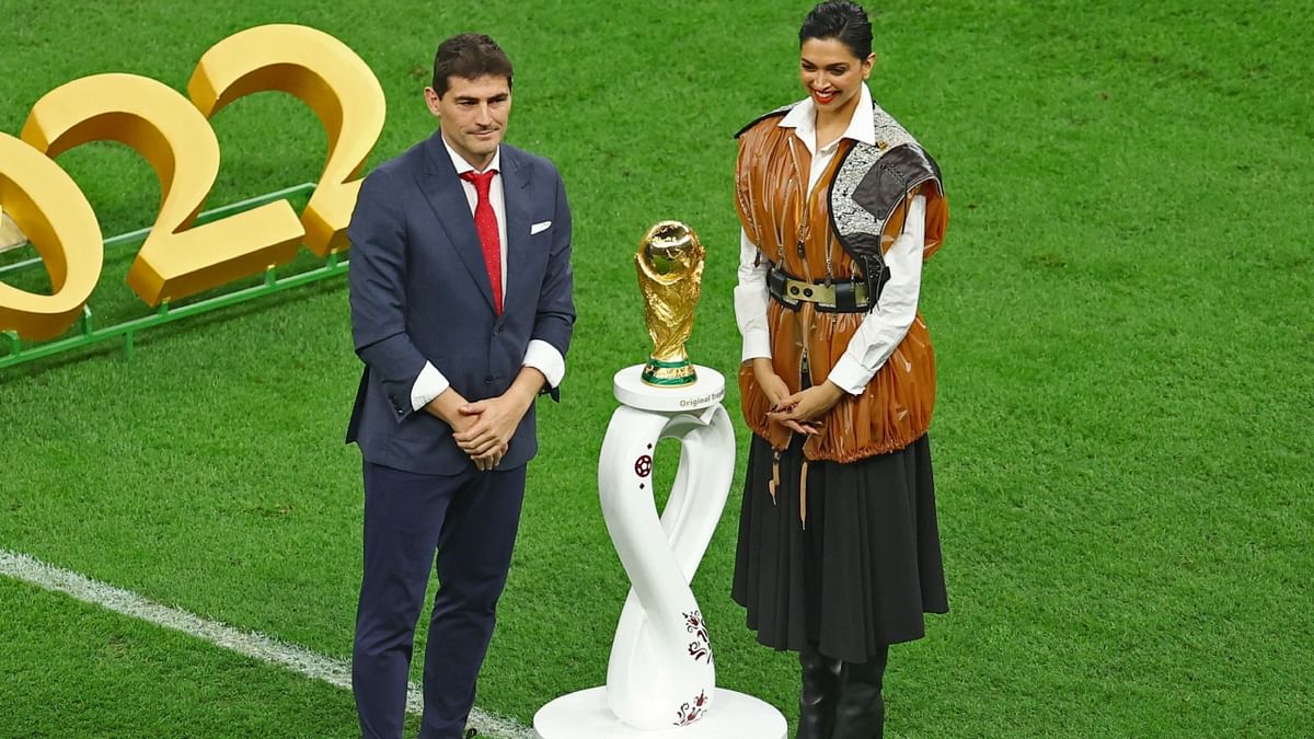 Actor Deepika Padukone became the first Indian to unveil the FIFA World Cup trophy. Credit: AFP Photo