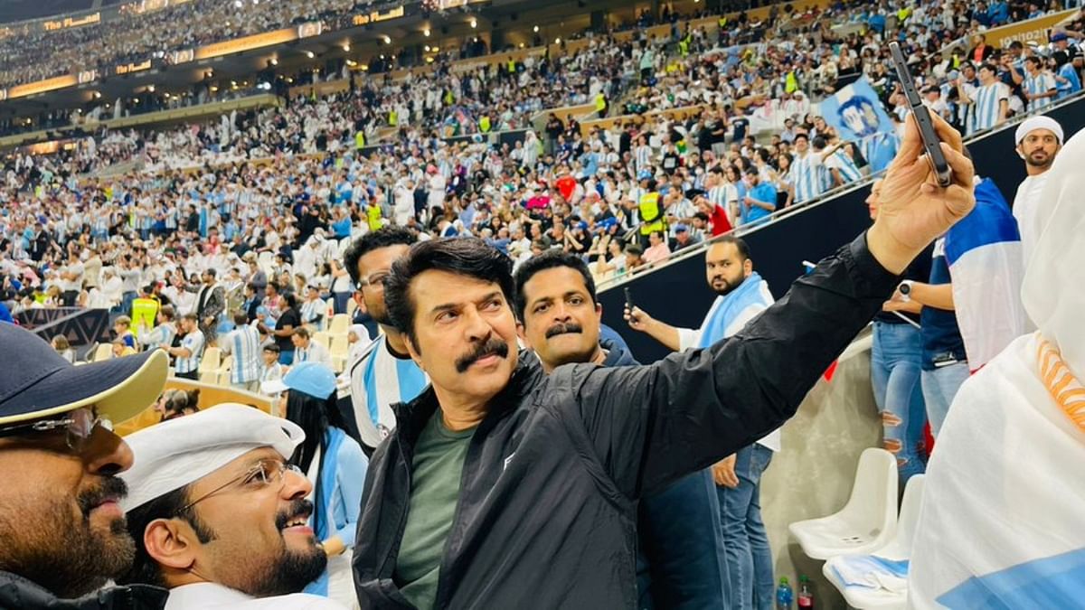 Malayalam superstar Mammootty is seen clicked selfie with his fans at Lusail Stadium in Doha. Credit: Twitter/@mammukka