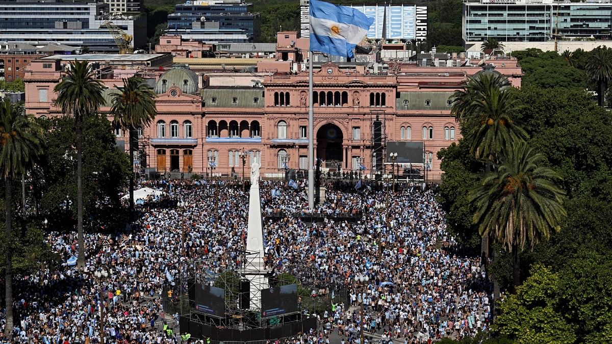Millions of Argentines who crammed the streets of Buenos Aires to celebrate an unforgettable moment with Lionel Messi and his World Cup winning teammates instead found themselves at a giant party bereft of its hallmark bus parade. Credit: AFP Photo