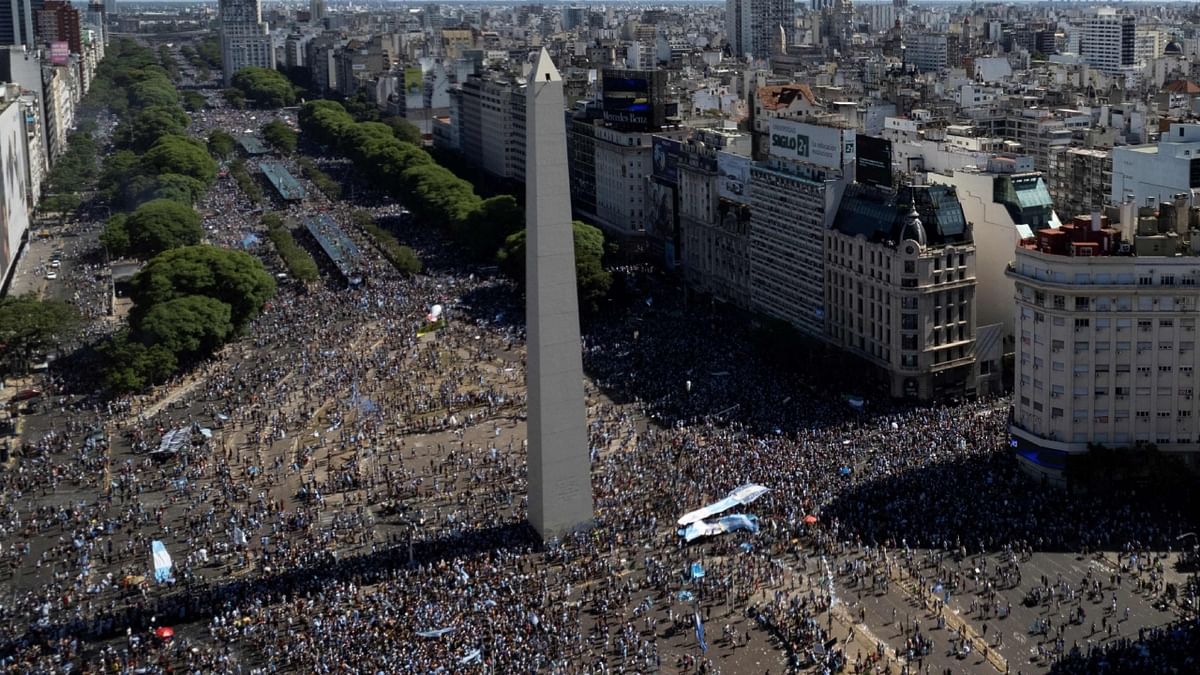 After flying over key points of Buenos Aires where fans had gathered, the helicopters returned to the headquarters of the Argentine Football Association outside the capital. Credit: AFP Photo