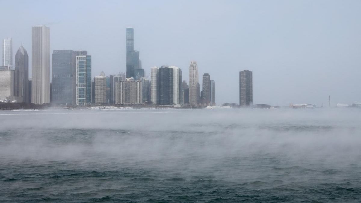 Mist rises from Lake Michigan in Chicago on December 23, 2022, where temperatures reached -6F (-21C) ahead of the Christmas holiday. Credit: AFP photo