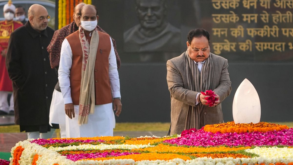 BJP President JP Nadda pays tribute to former prime minister Atal Bihari Vajpayee on his birth anniversary as other dignitaries look on, at Sadaiv Atal, in New Delhi. Credit: PTI Photo