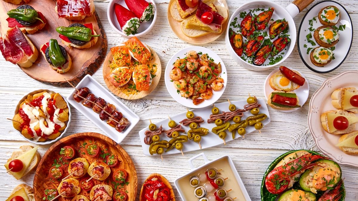 From the world-famous Jamon iberico to legendary paella, tortilla de patatas and croquetas, Spain has some amazing lip smacking foods and ranks third on TasteAtlas' global list of the best cuisines for 2022. Credit: Getty Images