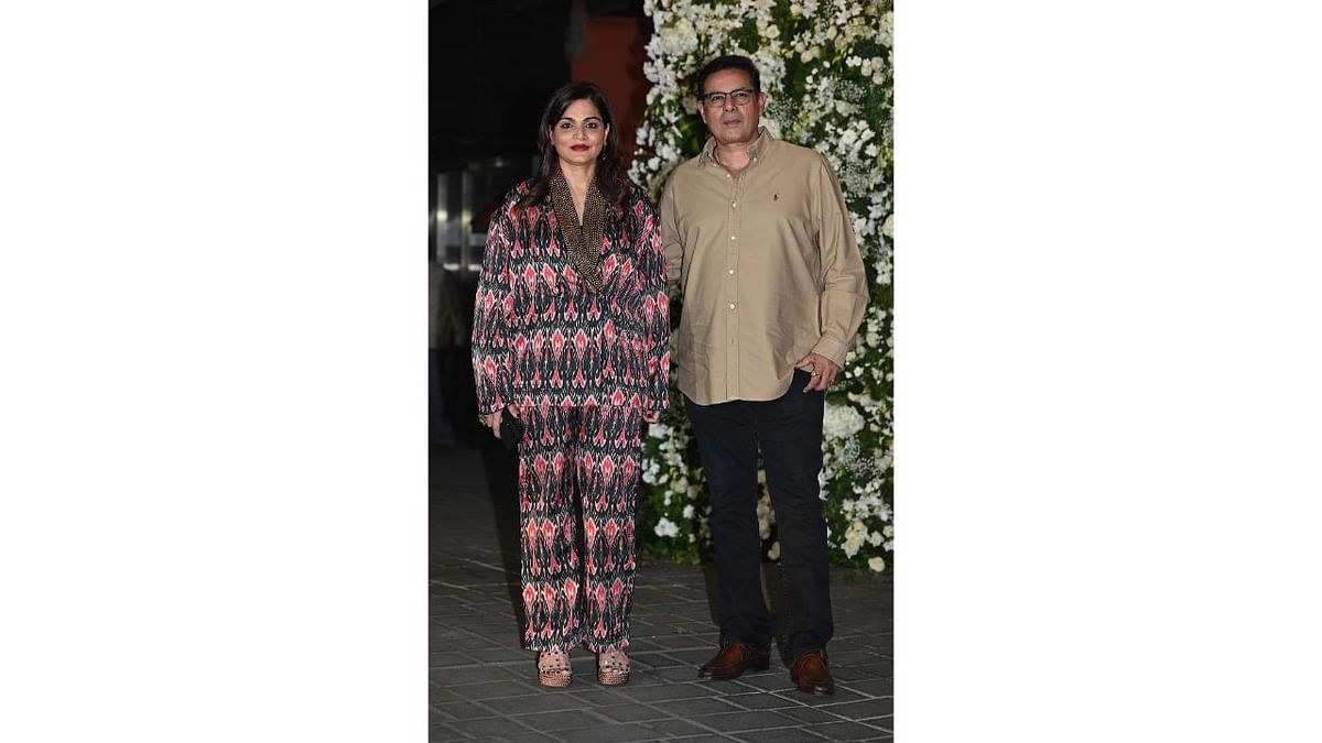 Salman's sister Alvira Khan and Atul Agnihotri pose for a photo as they arrive for the party. Credit: AFP Photo