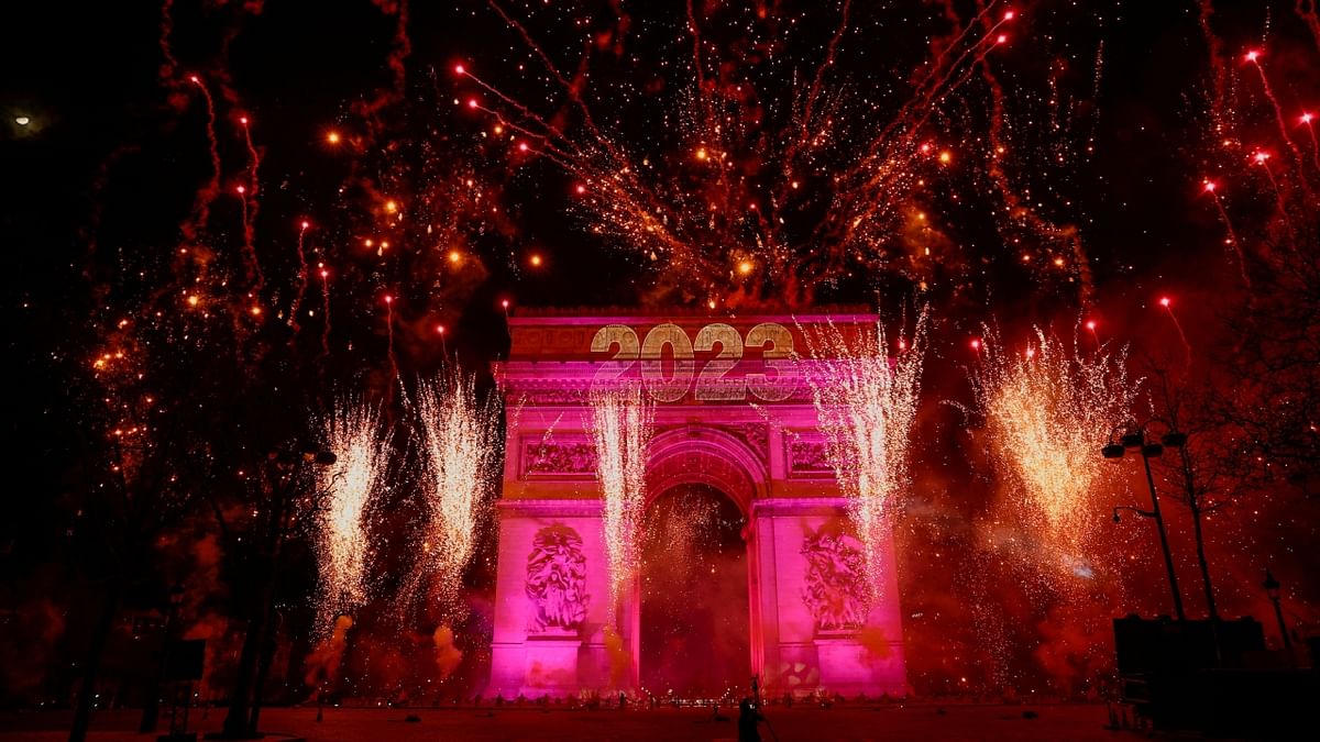 Fireworks illuminate the sky over the Arc de Triomphe during the New Year's celebrations on the Champs Elysees avenue in Paris, France. Credit: Reuters Photo
