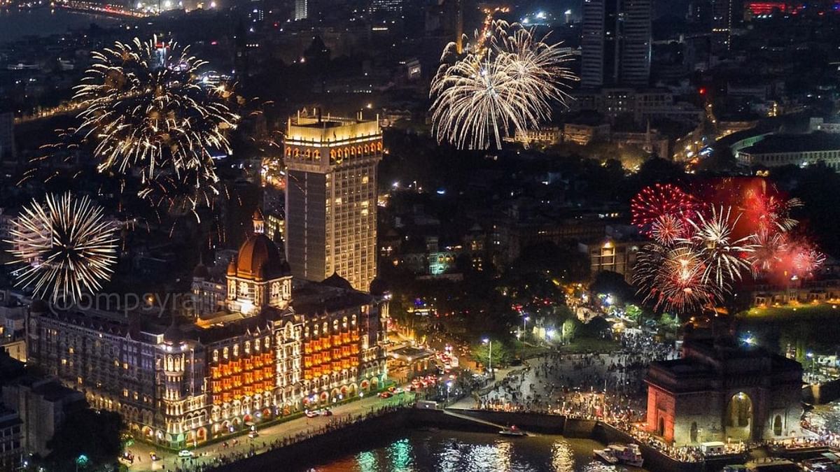 Fireworks light up the sky over the Taj Hotel and the Gateway of India to mark the New Year, in Mumbai. Credit: Instagram/@ompsyram