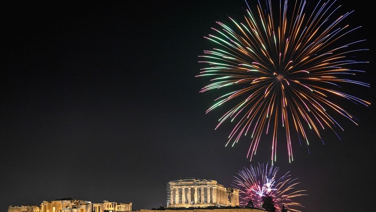 Fireworks explode over the Acropolis during New Year celebrations in Athens. Credit: AFP Photo
