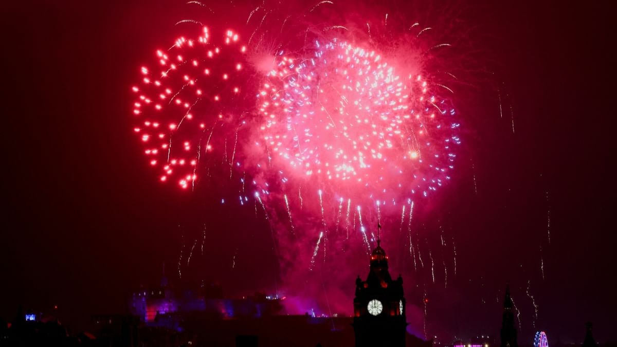Fireworks light up the sky over Edinburgh Castle and the Balmoral Hotel Clock to mark the New Year, in Edinburgh, Scotland. Credit: Reuters Photo