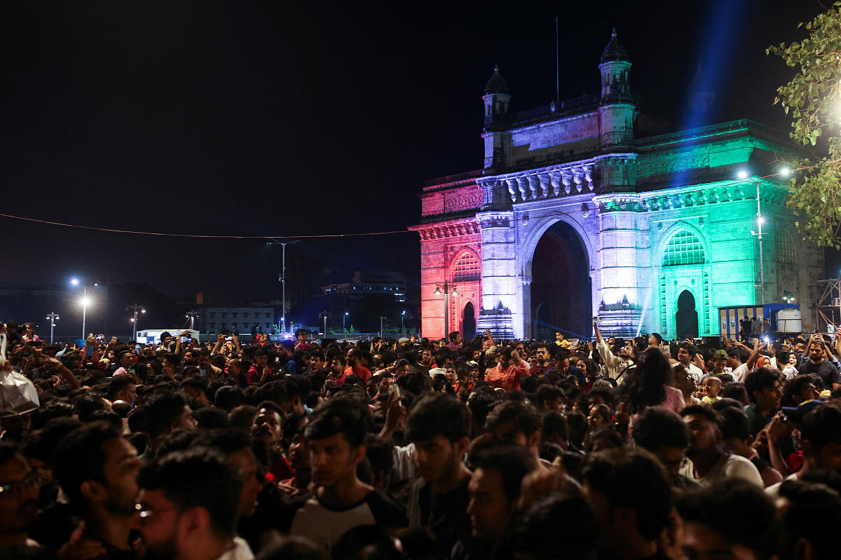 People gather at Gateway of India on New Year's Day in Mumbai, India. Credit: Reuters Photo