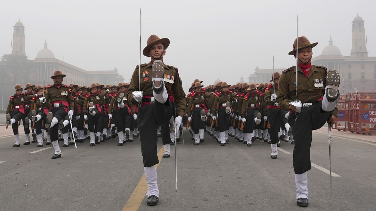 The Assam Rifles contingent rehearsing for the Republic Parade 2023 at the Kartavya Path during a cold and foggy morning, in New Delhi. Credit: PTI Photo