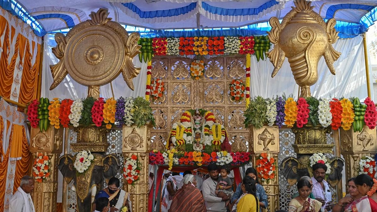 Several prominent Vishnu temples have been decked up with a variety of flowers for the occasion. Credit: AFP Photo