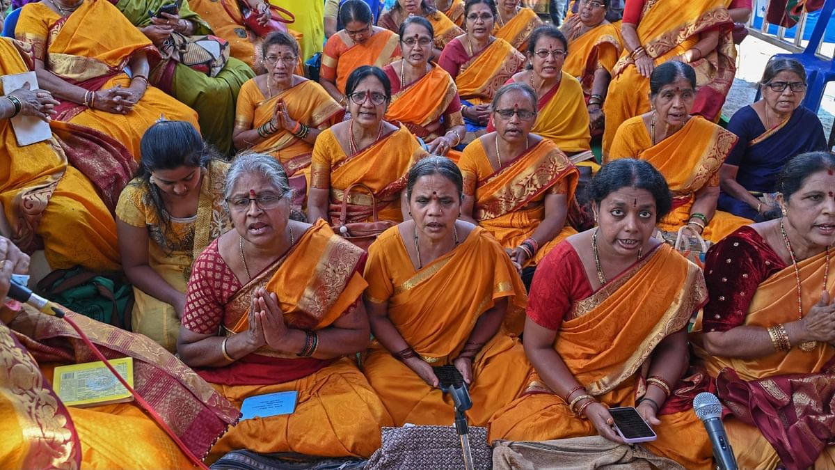 Devotees sing devotional songs at a temple on the occasion, in Bengaluru. Credit: AFP Photo