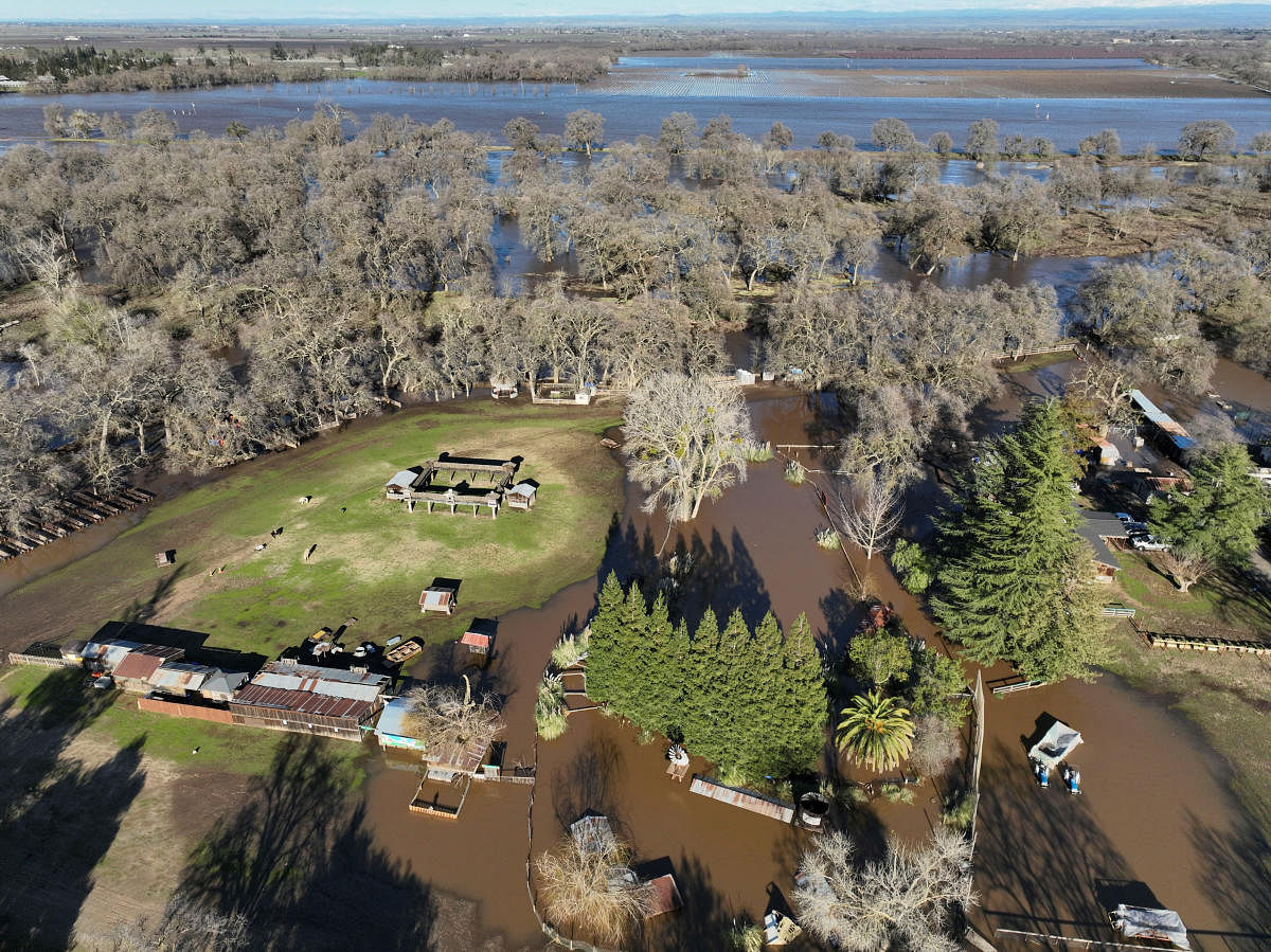 An aerial view shows the damage after rainstorms caused a levee to break, flooding Sacramento County roads near Wilton, California. Credit: Reuters Photo