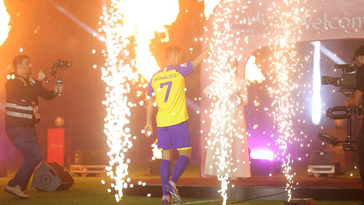 Ronaldo greeted the club's fans with equal enthusiasm during his unveiling at the Mrsool Park Stadium. Credit: AFP Photo