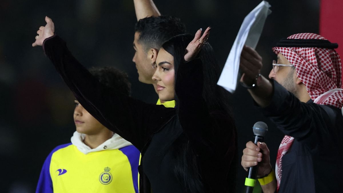 Georgina Rodriguez greets the crowd during Ronaldo's Al Nassr unveiling ceremony. Credit: AFP Photo